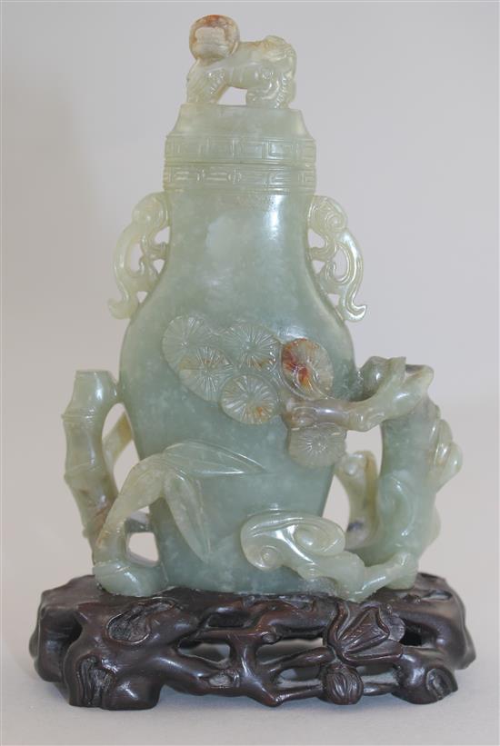 A Chinese celadon jade vase and cover, late 19th / early 20th century,